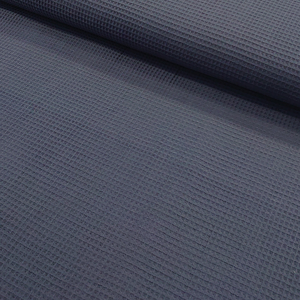 Vaffelvævet bomuld i støvet blå