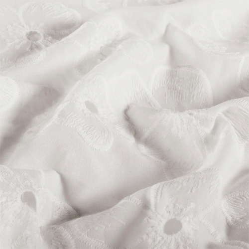 Blomstret broderet bomuld